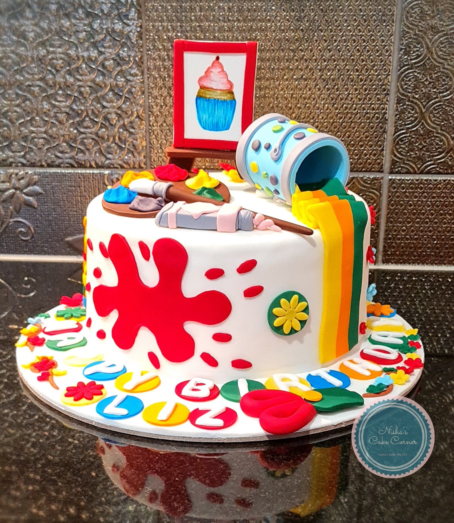 Art Themed Cake with Paint Splatters for creative celebration