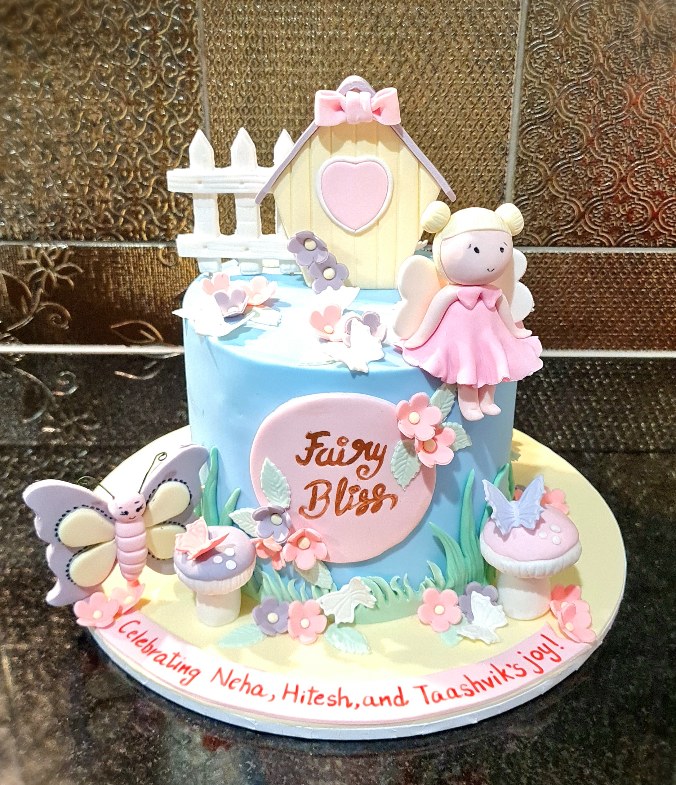 Fairy Bliss Themed Cake with Figurines for Birthday celebration