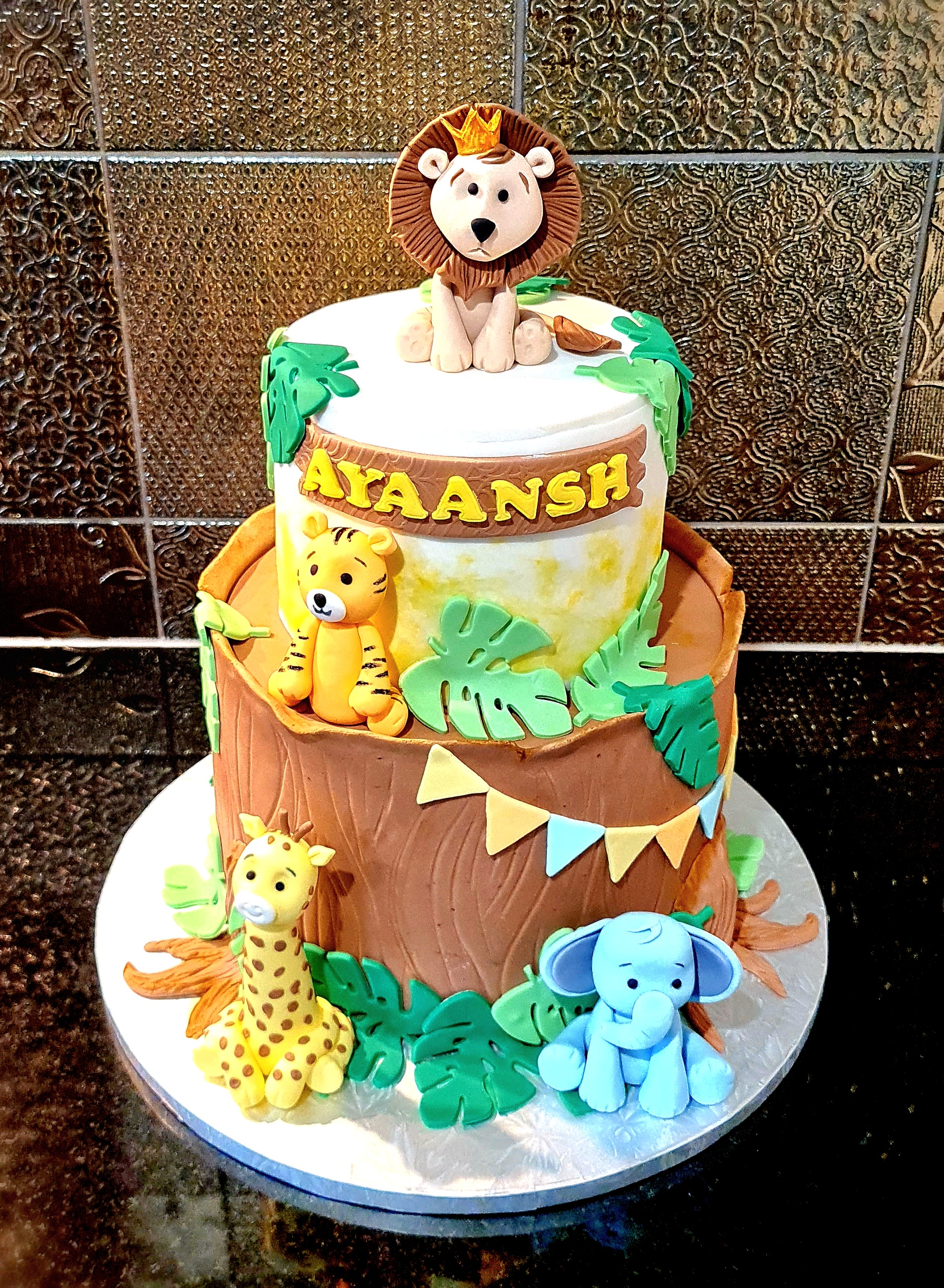 Jungle Theme Cake with Animal Figurines for Birthday adventure