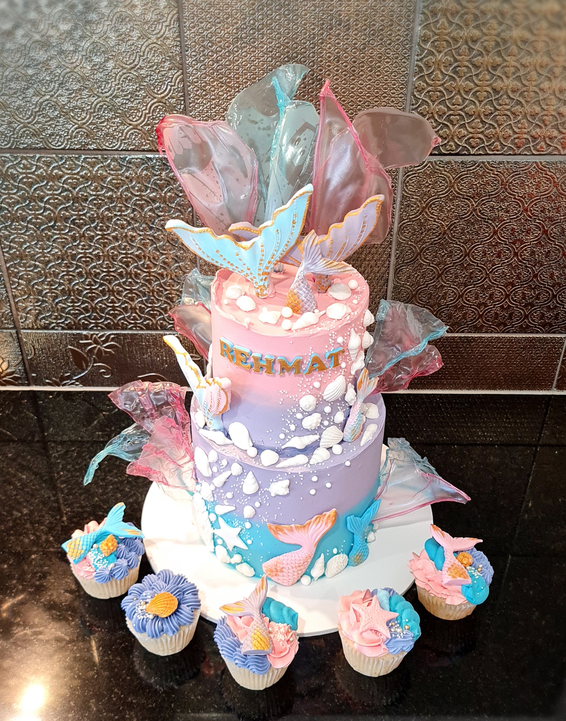 Two-Tier Mermaid Themed Cake with Cupcakes for Rehmat's Birthday celebration