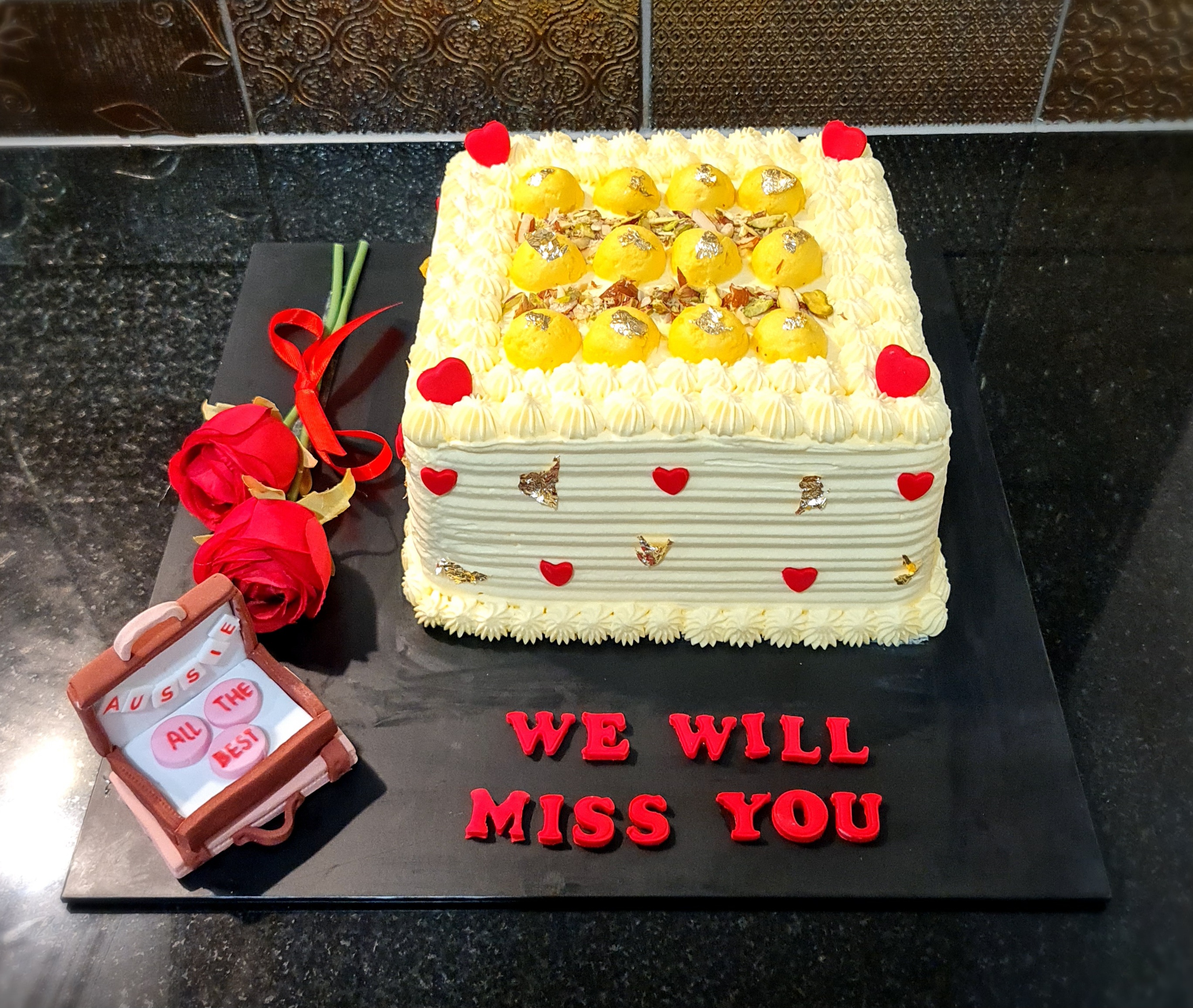 Rasmalai Farewell Fresh Cream Cake with 'We Will Miss You' message and decorative suitcase